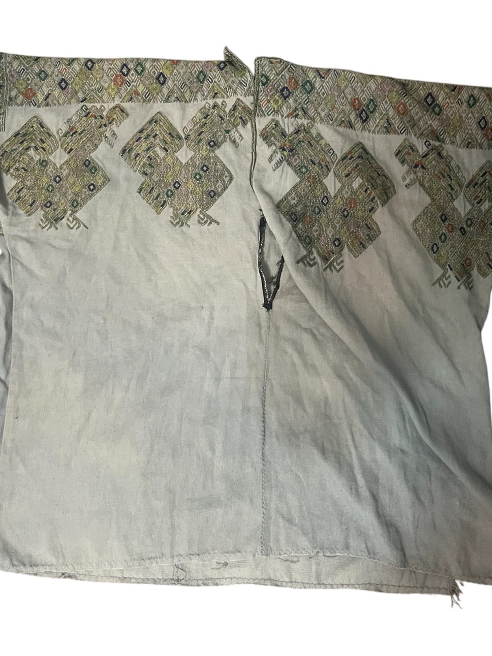 Green peasant top with embroidered detail